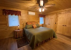 Log cabin master bedroom